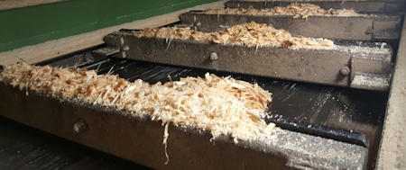 Chaînes racleuses pour copeaux de bois